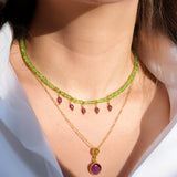 PASIFLORA PERIDOT & RHODOLITE GARNET CHARMS NECKLACE